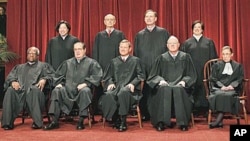 The justices of the U.S. Supreme Court gather for a group portrait at the Supreme Court in Washington, October 2010. (file photo)