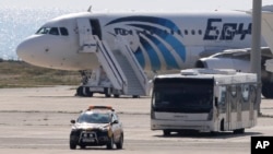 A bus carrying some passengers from the hijacked EgyptAir aircraft as it landed at Larnaca airport, March 29, 2016. 