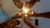 Men toast with their glasses of wine at a restaurant in Phnom Penh, Cambodia, October 18, 2018. 