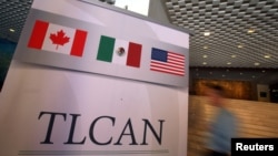 A NAFTA banner is seen during the fifth round of NAFTA talks involving the United States, Mexico and Canada, in Mexico City, Nov. 18, 2017.