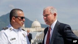 U.S. Attorney General Jeff Sessions speaks with Howard Augusto Cotto Castaneda, Director General of the National Police as they look over the city from the roof during a visit to the National Police Headquarters in San Salvador, El Salvador, July 28, 2017.