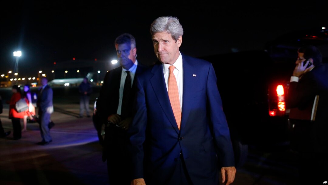 U.S. Secretary of State John Kerry is seen by his plane in Tel Aviv, Israel, Wednesday, July 23, 2014, engaged in shuttle diplomacy on the Gaza conflict.