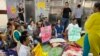 HIV activists who demanded a regular supply of antiretroviral therapy drugs for all HIV patients in India have just ended their protest after authorities met their demand, in New Delhi, Sept. 1, 2022. (Jitendra Jha/VOA)