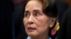 Court Convicts Suu Kyi on Two Corruption Charges