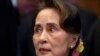 Court Convicts Suu Kyi on Two Corruption Charges