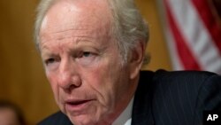 FILE - Then-Chairman Joe Lieberman, ID-Conn., leads a hearing of the Senate Committee on Homeland Security and Governmental Affairs on Capitol Hill in Washington, Sept. 19, 2012.