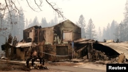 Sebuah bangunan yang hangus terbakar amukan "Camp Fire" di Paradise, California, 13 November 2018. (Foto: dok).