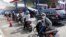 Motorists queue up to fill up their tanks after the government announced an increase in fuel prices, at a gasoline station in Jakarta, Indonesia, Sept. 3, 2022. 