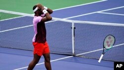 Frances Tiafoe, of the United States, celebrates after defeating Rafael Nadal, of Spain, during the fourth round of the U.S. Open tennis championships, Monday, Sept. 5, 2022, in New York. (AP Photo/Eduardo Munoz Alvarez)