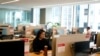 People work at the Yelp office in San Francisco on February, 14, 2023. (AP Photo/Jeff Chiu, File)
