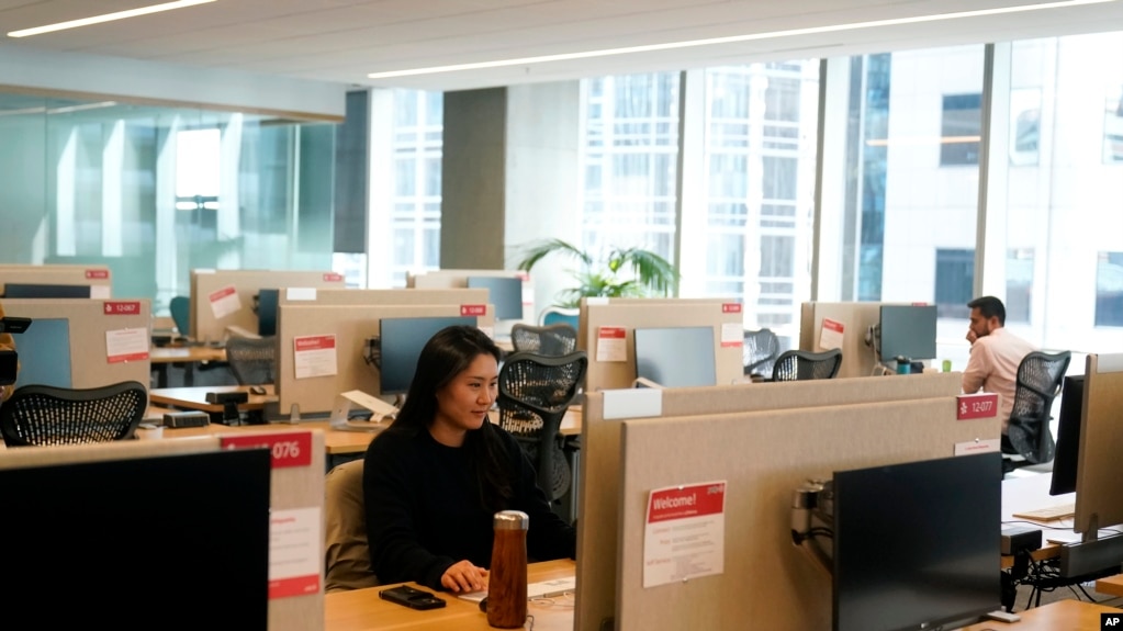 People work at the Yelp office in San Francisco on February, 14, 2023. (AP Photo/Jeff Chiu, File)