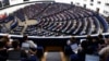 FILE - European Parliament members meet in a plenary session on Sept. 14, 2022, in Strasbourg, France.