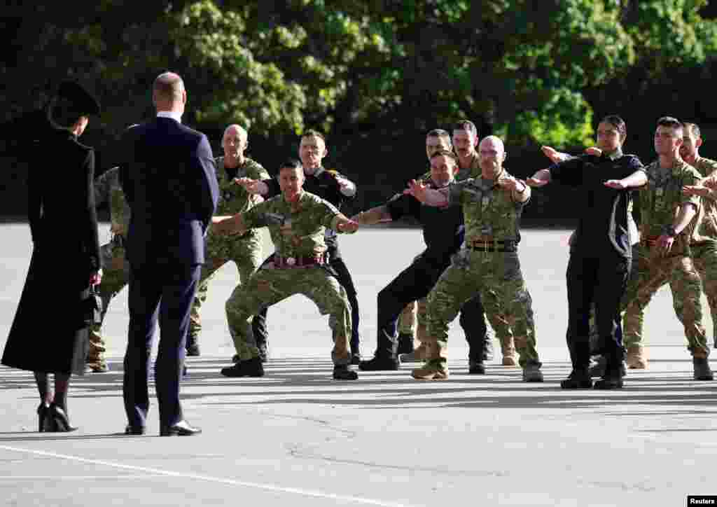 New Zealand's soldiers perform the haka for Britain's William, Prince of Wales, and Catherine, Princess of Wales, during their visit to ATC Pirbright, following the death of Britain's Queen Elizabeth II, near London, Britain.