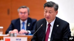 File - Chinese President Xi Jinping speaks at the Shanghai Cooperation Organization summit in Samarkand, Uzbekistan, Sept. 16, 2022. (Uzbekistan Presidential Press Service via AP)