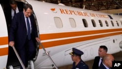 FILE - Cyprus President Nicos Anastasiades disembarks from a jet at Elefsina Air Base, in western Athens, Greece, Sept. 2, 2022.