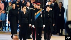 Left to right: Zara Tindall, Lady Louise, Princess Beatrice, Prince William, Prince Harry, Princess Eugenie, Viscount James Severn and Peter Phillips at vigil, Sept. 17, 2022.