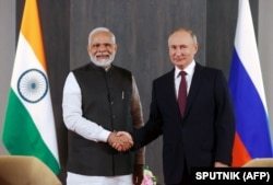 Rusya Cumhurbaşkanı Vladimir Putin ve Hindistan Başbakanı Narendra Modi Şanghai İşbirliği Örgütü'nün liderler zirvesinde, 16 Eylül 2022.