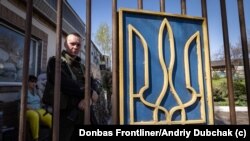 Ukrainian soldier guarding military hospital in
Zaporizhzhia