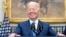 FILE - President Joe Biden smiles while speaking in the Roosevelt Room at the White House, April 28, 2022, in Washington. The White House Correspondents’ Association dinner returns Saturday night after a hiatus due to the COVID pandemic.