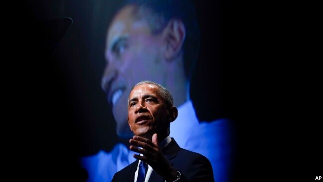 FILE - Former US President Barack Obama speaks during a memorial service for former Senate Majority Leader Harry Reid at the Smith Center in Las Vegas, Jan. 8, 2022.