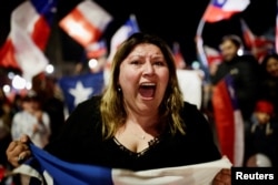 Supporters of "I Reject" option react to results of the referendum on a new Chilean constitution in, in Concepcion, Chile, Sept. 4, 2022.