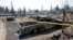 Crime scene tape barricades the area near burned cars, in the aftermath of the Mill Fire, in Weed, California, U.S., Sept. 3, 2022. 