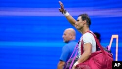 Rafael Nadal of Spain waves to fans after his loss to Frances Tiafoe of the United States during the fourth round of the U.S. Open tennis championships, Sept. 5, 2022, in New York.