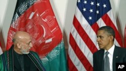 Shugaban Amurka Barack Obama yake ganawa da shugaban Afhanistan Hameed Karzai.