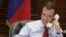 Russia's President Dmitry Medvedev speaks with U.S. President Barack Obama on the phone. ປະທານາທິບໍດີ
ຣັດເຊຍລົມກັບປະທານາທິບໍດີສະຫະຣັດ
ທາງໂທຣະຊັບ.