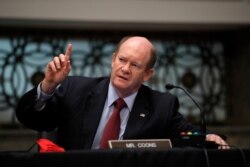 FILE - Sen. Chris Coons, D-Del., speaks during a Senate Judiciary Committee business meeting on Capitol Hill in Washington, June 11, 2020.