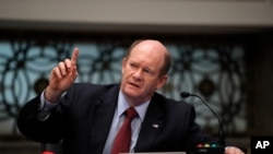 FILE - Sen. Chris Coons, D-Del., speaks during a Senate Judiciary Committee business meeting on Capitol Hill in Washington, June 11, 2020. 