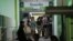 Relatives of people hospitalized after using cocaine cut with a toxic substance are seeen at San Bernardino Hospital in Hurlingham, Argentina, Feb. 2, 2022.