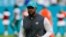FILE - Miami Dolphins head coach Brian Flores runs off the field after winning a game against the New York Jets at Hard Rock Stadium, in Miami Gardens, Florida, Dec 19, 2021. (USA Today Sports / via Reuters)