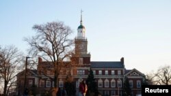 FILE - Students walk on the campus of Howard University, one of six historically Black colleges and universities (HBCUs) across the United States that received bomb threats, in Washington, Jan. 31, 2022.