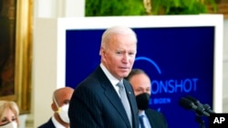 President Joe Biden speaks during a "cancer moonshot," event in the East Room of the White House, Feb. 2, 2022, in Washington.