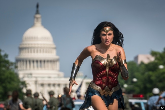 This image released by Warner Bros. Pictures shows Gal Gadot as Wonder Woman in a scene from "Wonder Woman 1984." (Clay Enos/Warner Bros Pictures via AP)