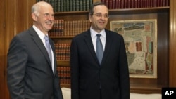 希腊总理帕潘德里欧(左)和希腊反对派领导人安东尼·萨马拉斯(资料照)