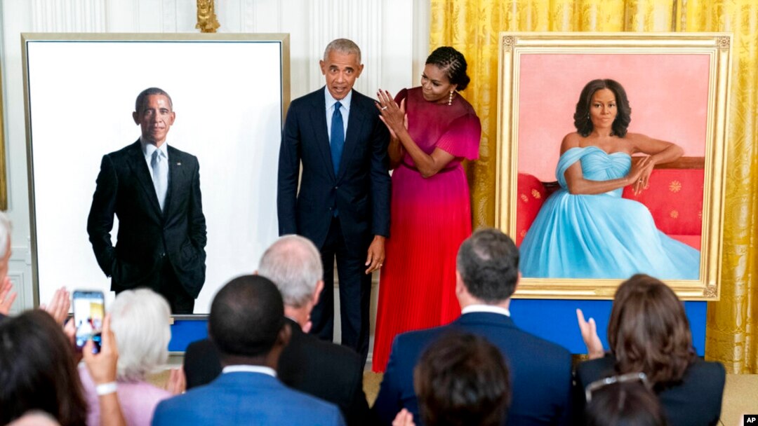 Former President Barack Obama and former first lady Michelle Obama unveil their official White House portraits during a ceremony in the East Room of the White House, Sept. 7, 2022, in Washington.
