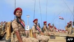 File - This handout image provided by the Ansarullah Media centre on Sept. 1, 2022 shows fighters loyal to Yemen's Houthi rebels taking part in a military parade in the western province of Hodeida.