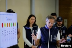 FILE - Director-General of the International Atomic Energy Agency (IAEA) Rafael Grossi speaks to reporters after his return from Ukraine where he and his team visited the Zaporizhzhia nuclear plant, at Vienna airport, in Schwechat, Austria, Sept. 2, 2022.