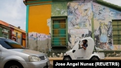 Davier Villalobos drives a micro electric vehicle in Maracaibo, Venezuela August 29, 2022. REUTERS/Jose Angel Nunez