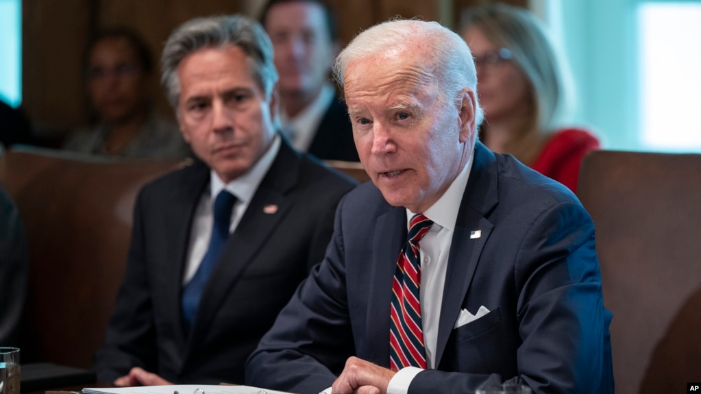 Secretary of State Antony Blinken listens to President Joe Biden at the White House, Sept. 6, 2022. Biden has decided to not designate Russia a state sponsor of terrorism, the White House said Tuesday.