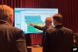 Missouri state Rep. Doug Richey points out elements of a proposed congressional redistricting map during a House debate on May 9, 2022, in Jefferson City, Missouri.