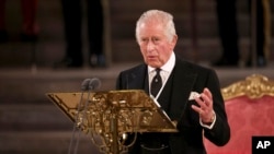 FILE - Britain's King Charles III speaks at Westminster Hall, where both Houses of Parliament are meeting to express their condolences following the death of Queen Elizabeth II, at Westminster Hall, in London, Sept. 12, 2022. 