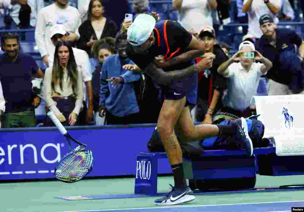 Australia&#39;s Nick Kyrgios smashes his racket after his quarterfinal match against Russia&#39;s Karen Khachanov at the U.S. Open tennis championships in New York.(Karen Khachanov REUTERS/Mike Segar)