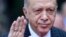 Turkey's President Recep Tayyip Erdogan waves to the crowd during a welcome ceremony in Sarajevo, Bosnia, Tuesday, Sept. 6, 2022. y