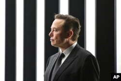 FILE - Elon Musk attends an event in Gruenheide, Germany, March 22, 2022.