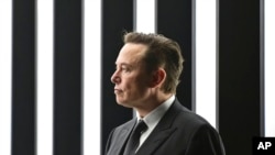 FILE - Elon Musk, Tesla CEO, attends the opening of the Tesla factory Berlin Brandenburg in Gruenheide, Germany, March 22, 2022. 