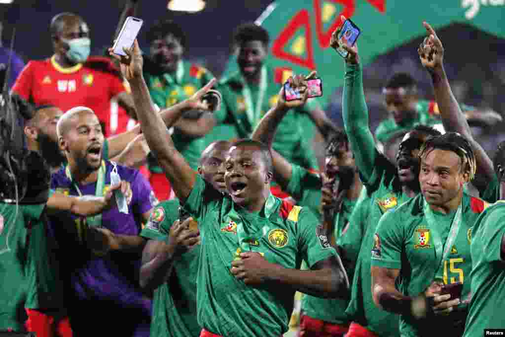 Cameroon players celebrate after finishing in third place, Feb. 5, 2022.