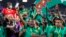 Cameroon players celebrate after finishing in third place, Feb. 5, 2022.